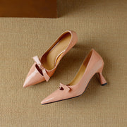 Pair of pink leather kitten heel pumps,top view