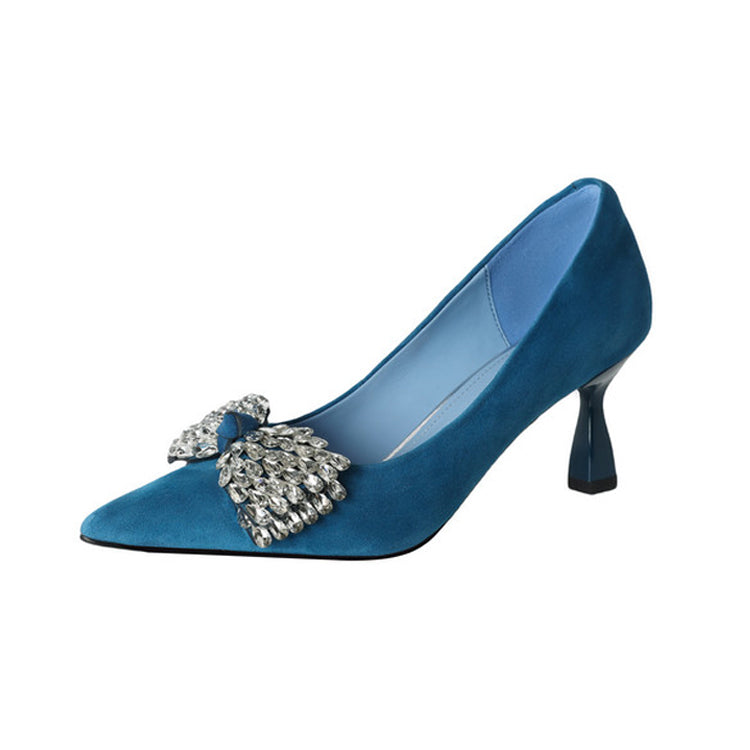 Blue kitten heel pumps with a decorative bow on a white background,suede upper mid-heel shoes